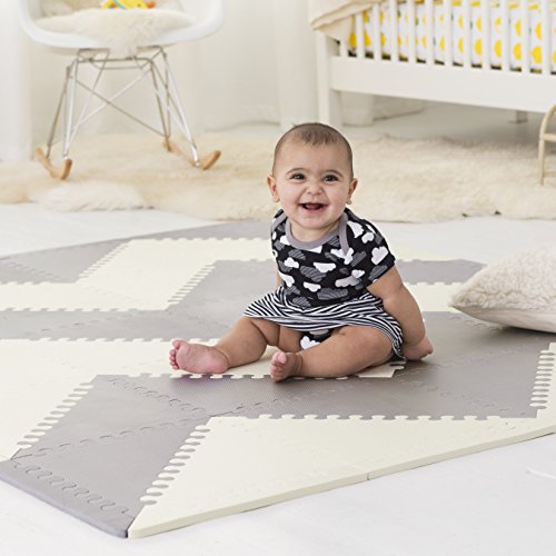 baby with rug
